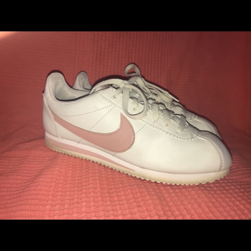 Pink, white, and gray vintage Cortez Nikes
